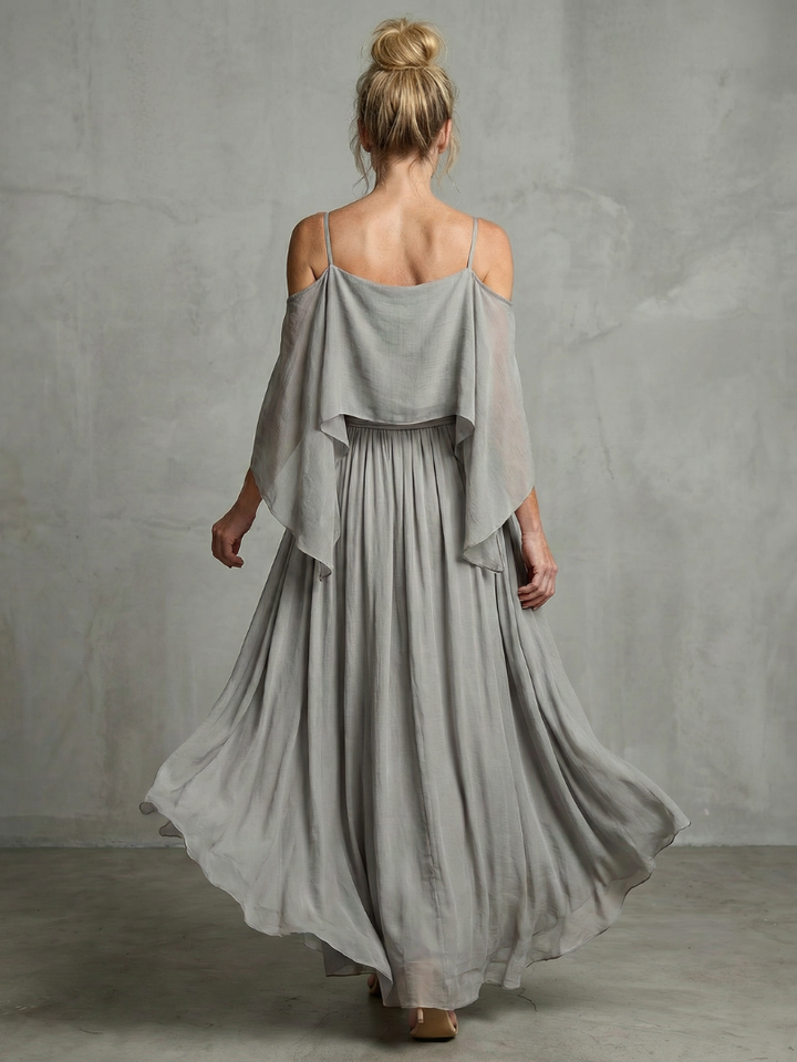 Gray cold-shoulder maxi dress, open back, draped sleeves and pleated skirt