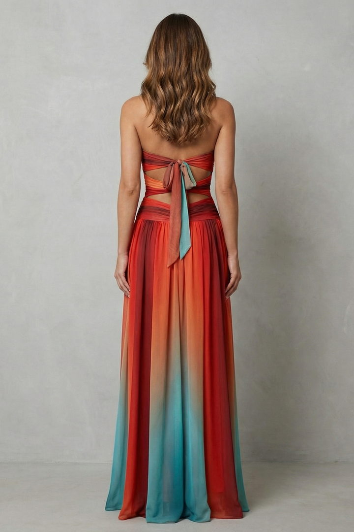 Strapless ombre maxi dress, open back with teal tie and striped skirt.