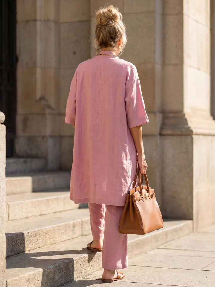 Pink women’s lounge set with open kimono layer and matching wide-leg pants from the back