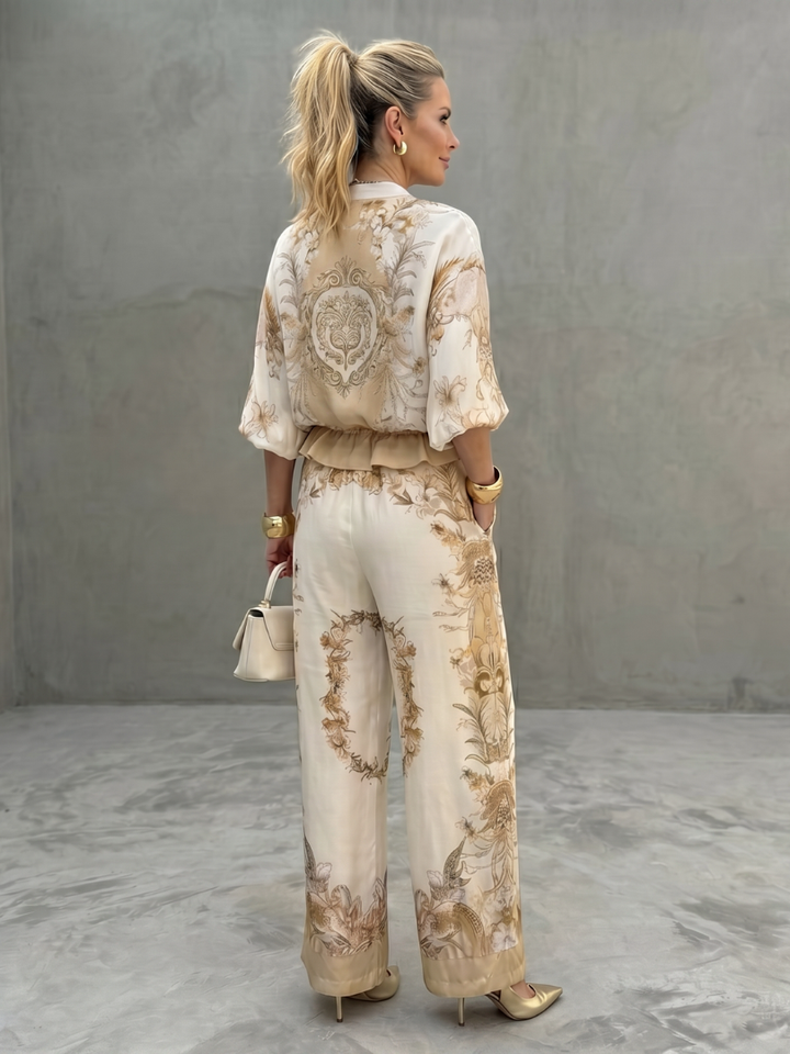 Printed pants set in cream with tan floral, back view of blouse and wide-leg pants