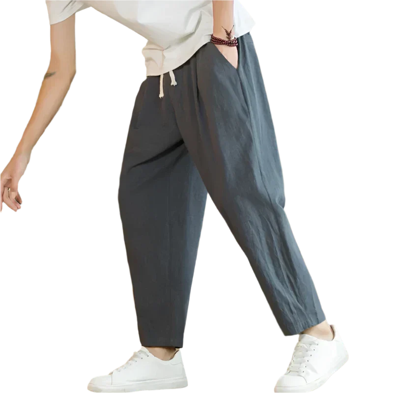 Dark gray cotton pants with drawstring waist, relaxed tapered leg, ankle length