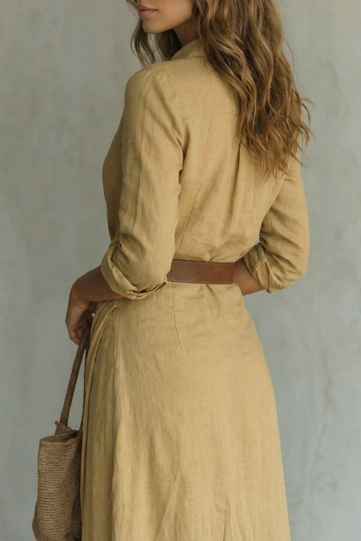 Tan button-front wrap maxi dress close-up: V-neck, long sleeves, belted waist