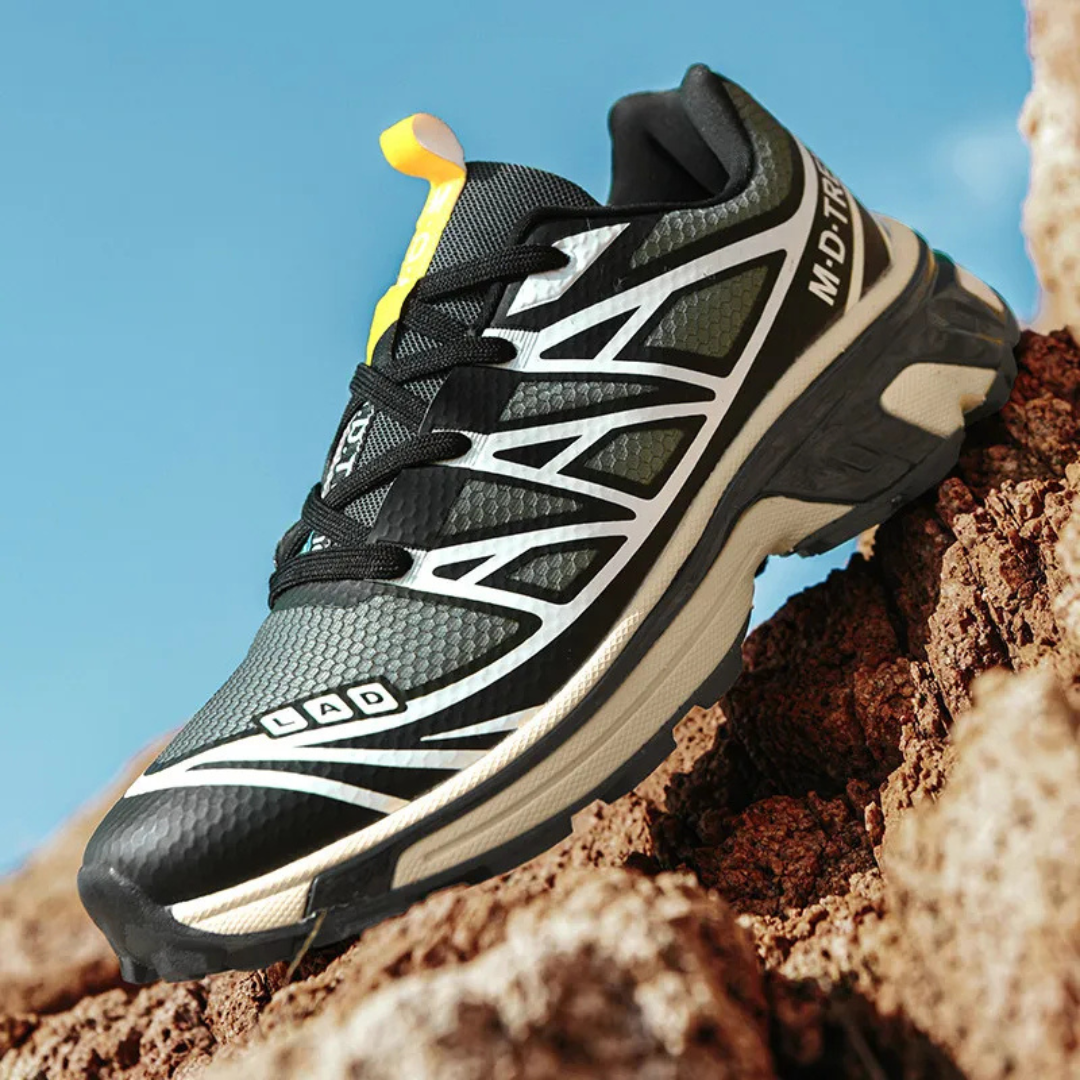 Air-cushioned lace-up walking sneaker, black with green trim and white zigzag stripes, yellow tab