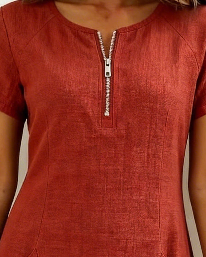 Rust red casual dress with centered half-zip and short sleeves