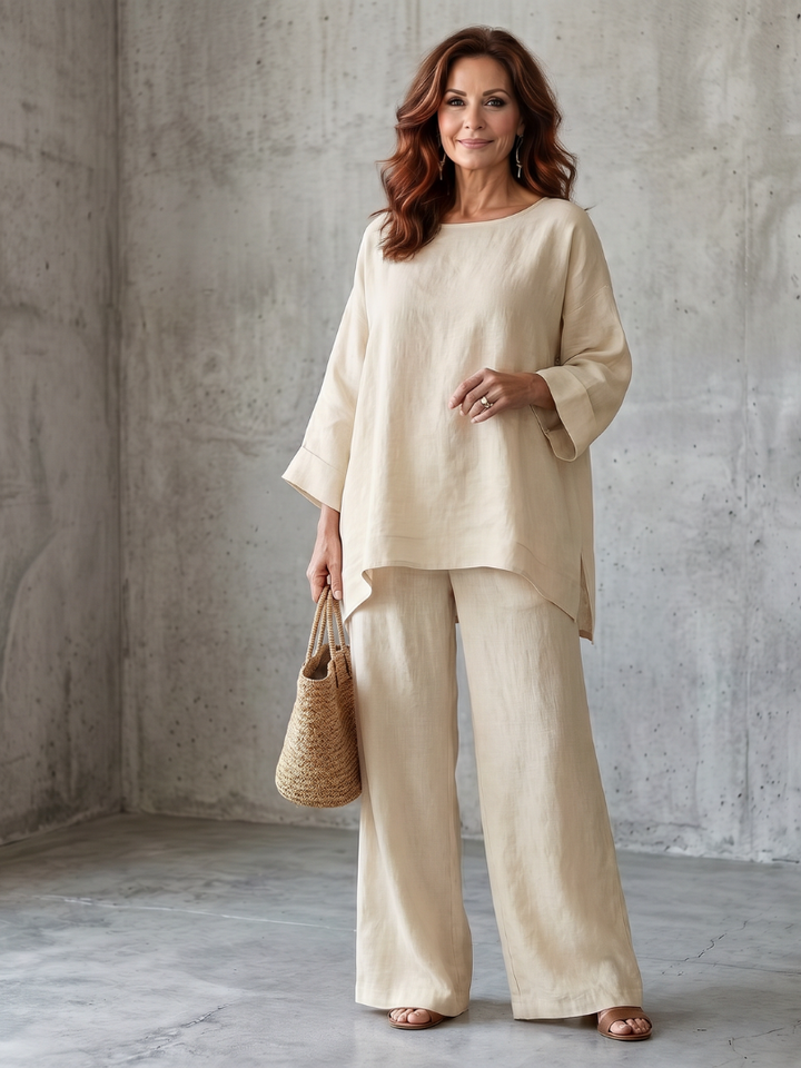Beige two-piece wide-leg pants set with loose tunic top and wide-leg trousers