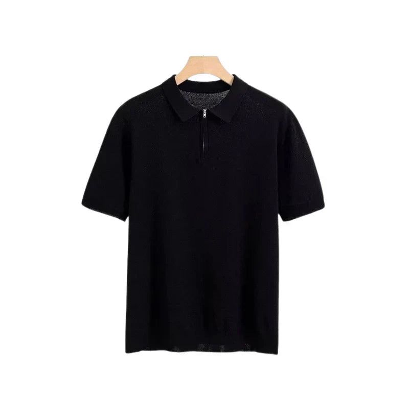 Black zip polo shirt with short sleeves, polo collar, and front quarter zip