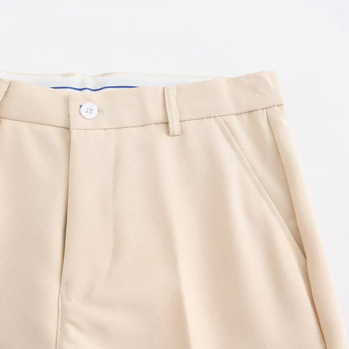 Nude stretch pants with button closure and flat front waistband