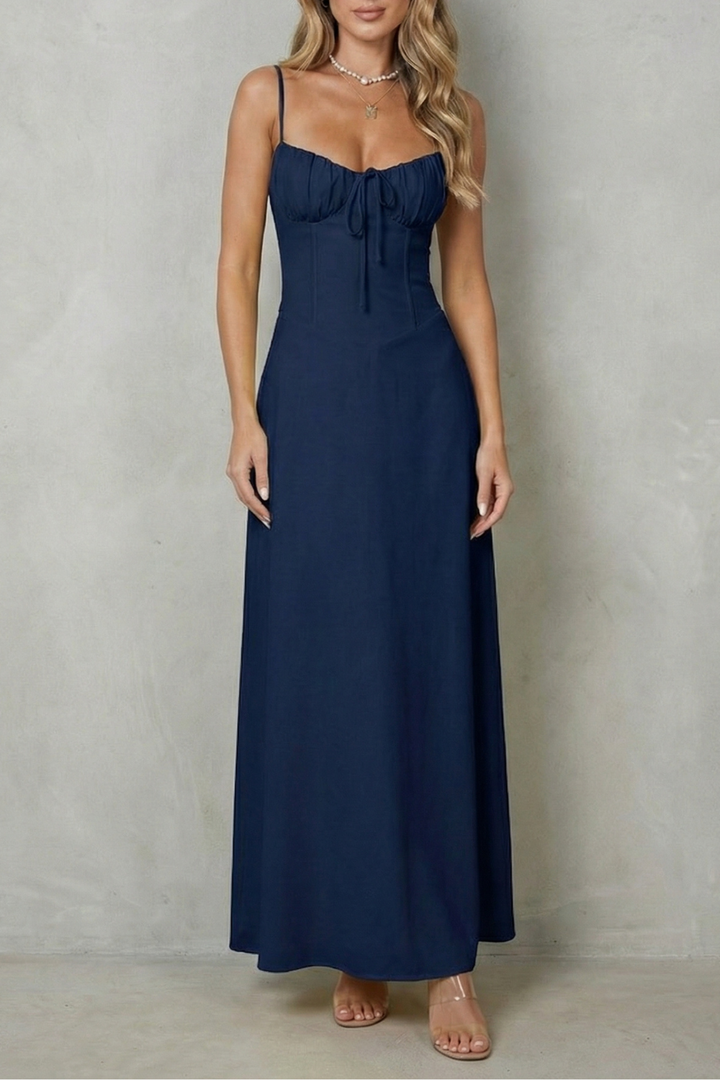 Navy corset maxi dress with spaghetti straps, ruched sweetheart neckline, and tie front