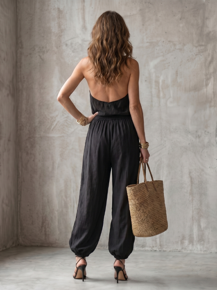Black open-back sleeveless top and wide-leg pants two-piece set