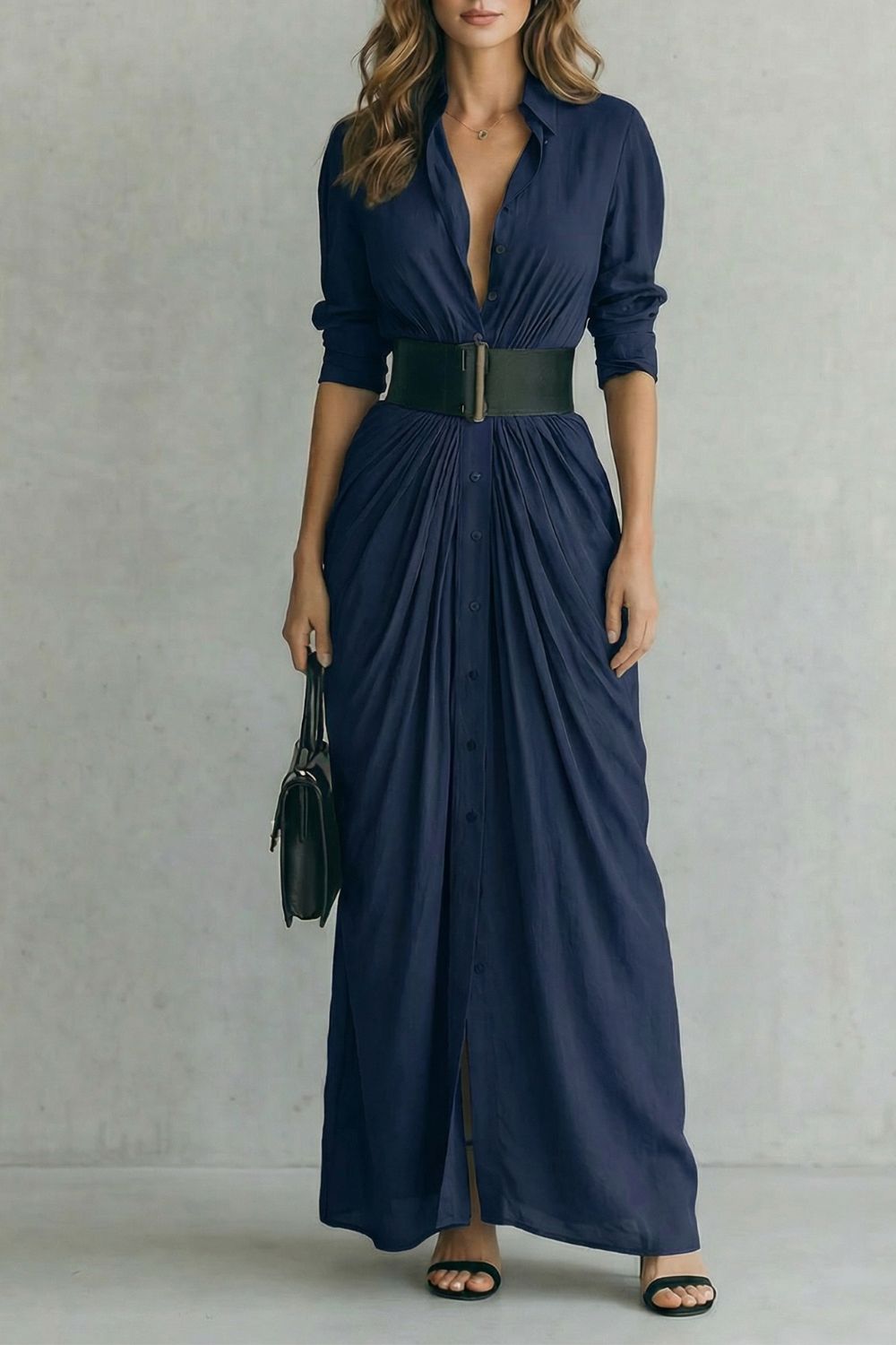 Navy shirt dress with V-neck, button front, green belt, gathered maxi skirt.