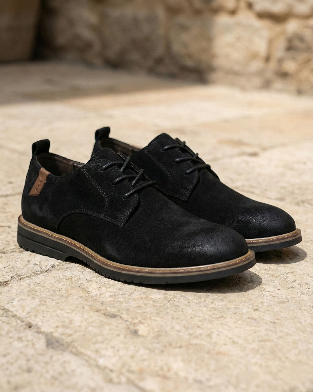Black leather Oxford shoes, lace-up pair with padded collar and rubber sole
