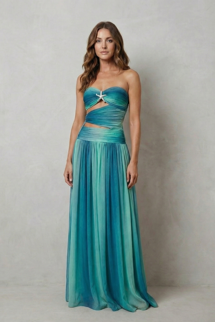 Strapless ombre maxi dress in teal with twisted sweetheart neckline and pleated skirt.