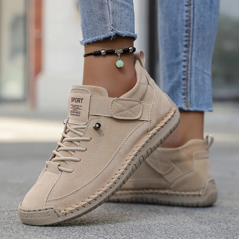 Beige orthopedic slip-on sneaker with lace-up front and side support strap
