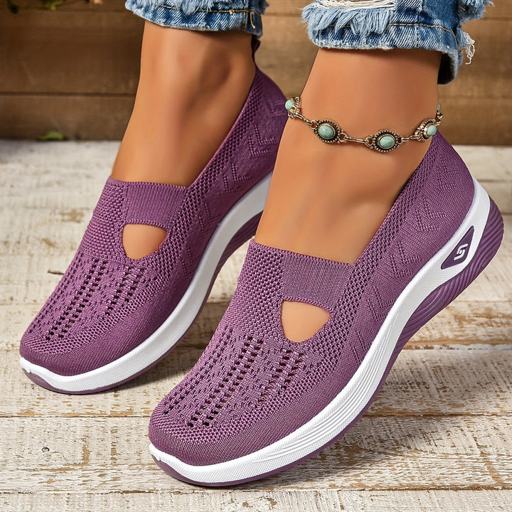 Purple knit slip-on sneakers with white sole and side cutout panels