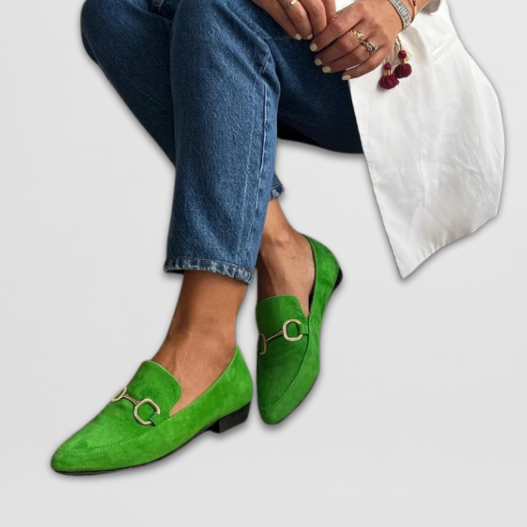 Green slip-on bit loafers with gold-tone metal bit detail and low heel