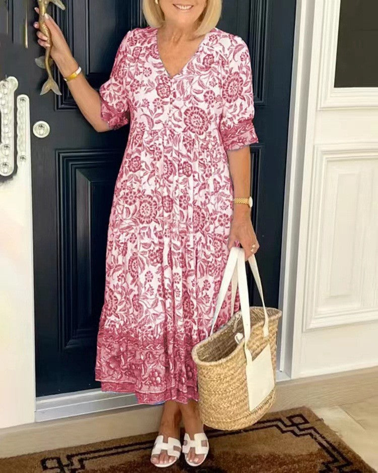 Pink floral V-neck tiered midi dress with short sleeves and gathered skirt tiers