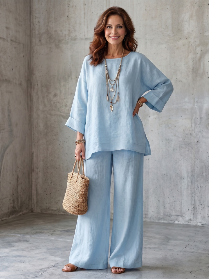 Light blue two-piece wide-leg pants set with loose blouse and wide-leg trousers