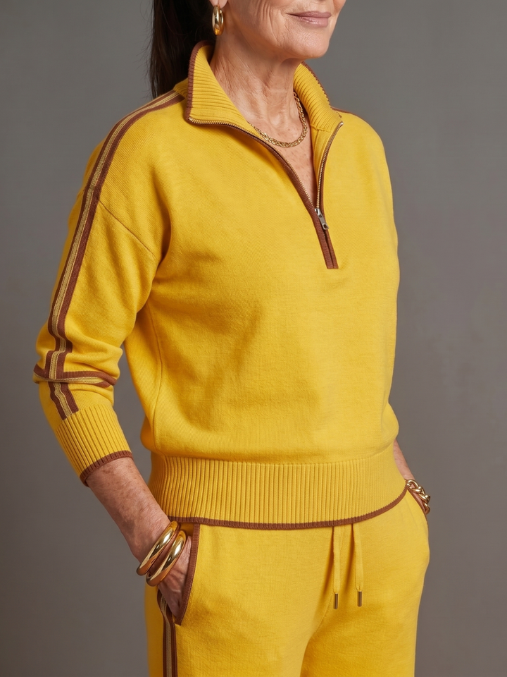 Yellow quarter-zip knit two-piece set with contrast trim: pullover top and track pants