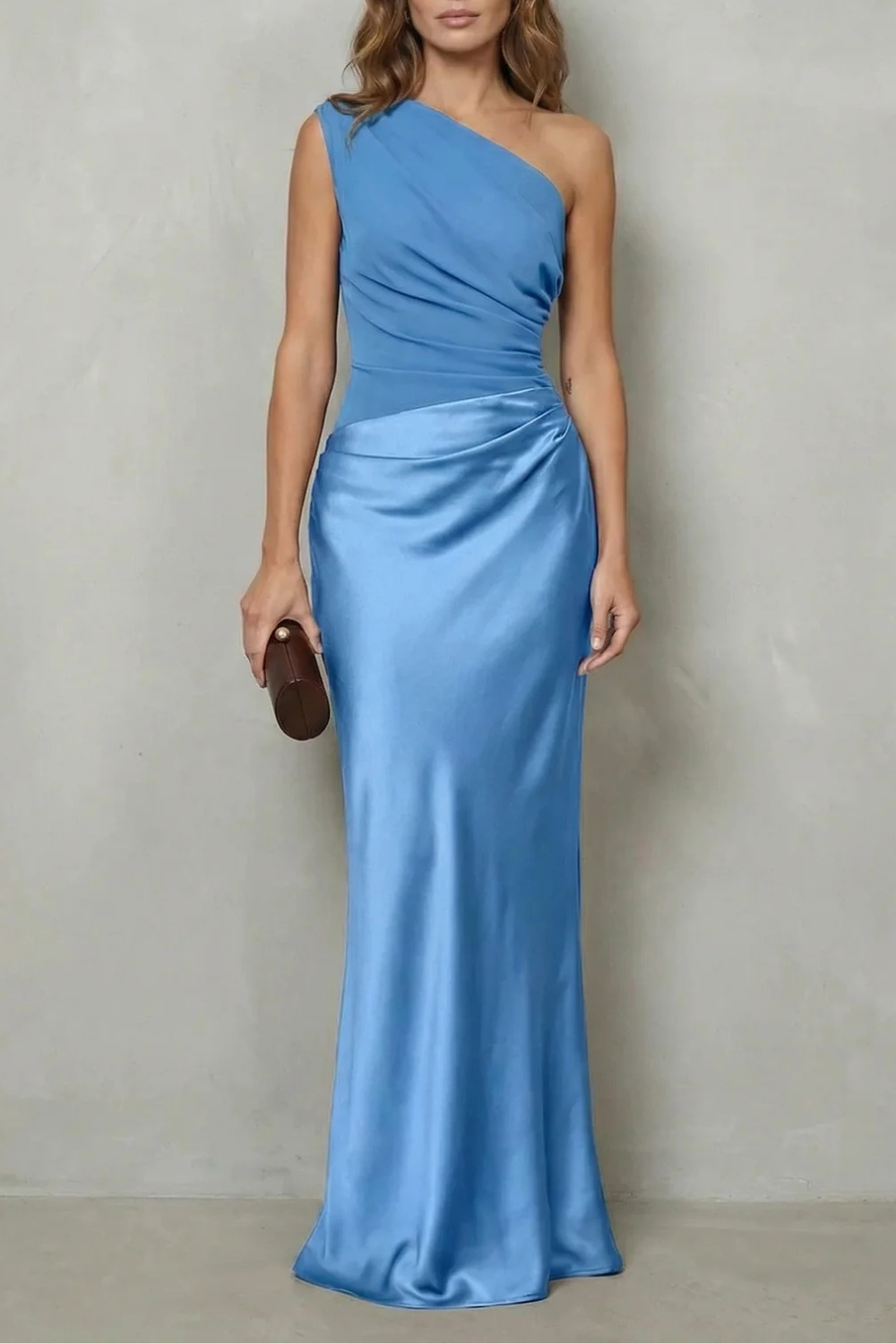 Light blue one-shoulder satin evening gown with draped bodice and ruched waist