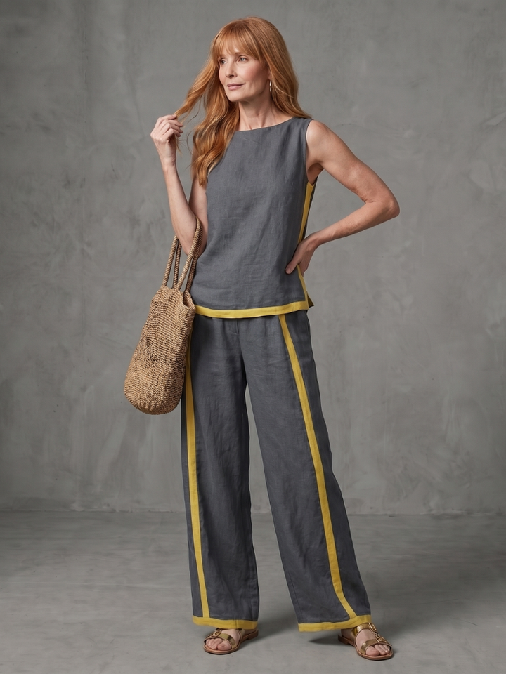 Gray linen set with sleeveless top and wide-leg pants, tan contrast trim stripe