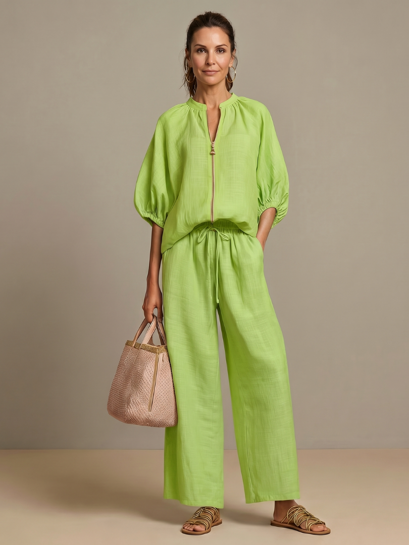 Green blouse and wide-leg pants set with zip-front, puff sleeves, drawstring waist