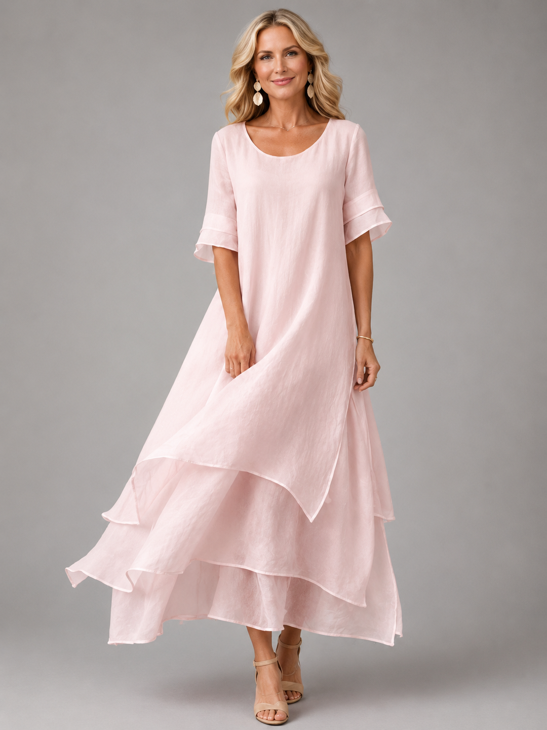 Pink maxi dress with short sleeves and tiered ruffle hem