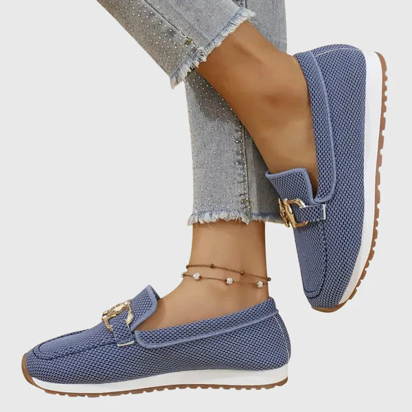 Blue women's slip-on loafers with gold buckle ornament and grippy sole