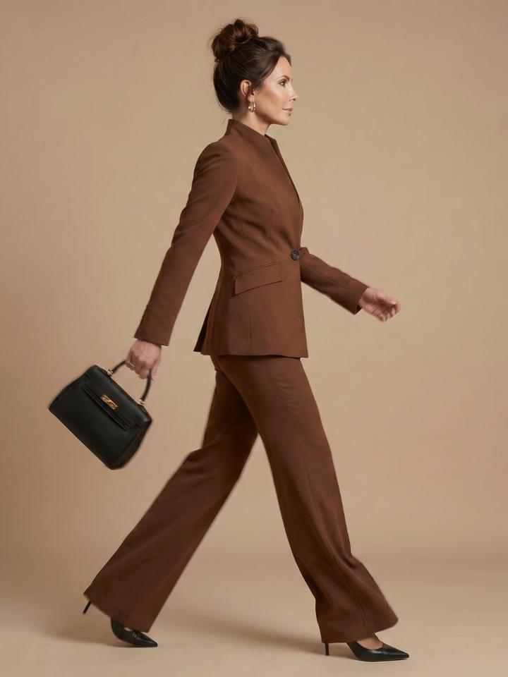 Women's belted blazer set in brown, side view with belted blazer and flared trousers