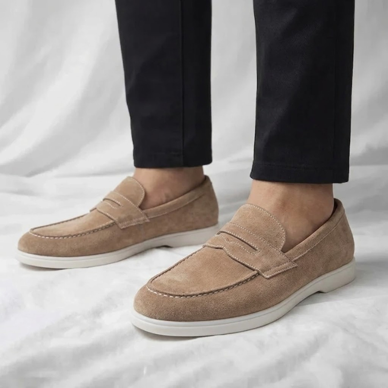 Men's suede loafers in light tan, slip-on style with padded collar and white sole