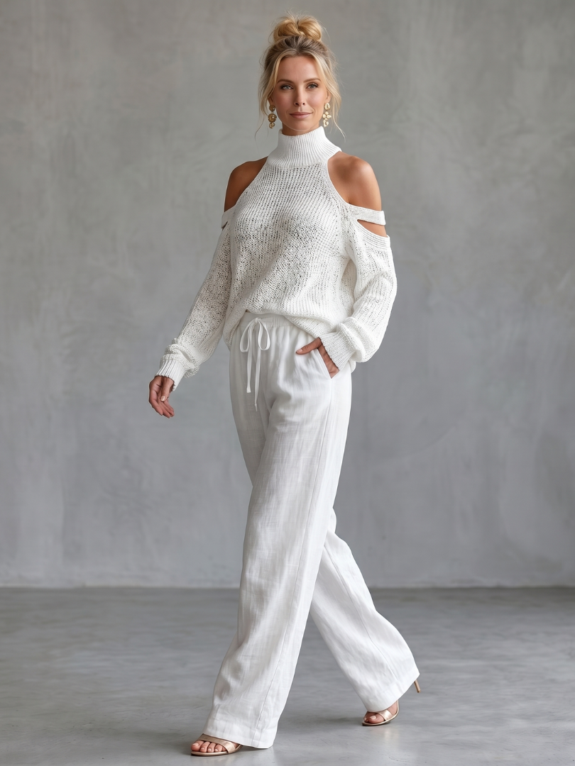 Women’s cutout sleeve knit set, front view of light beige cold-shoulder sweater and drawstring pants