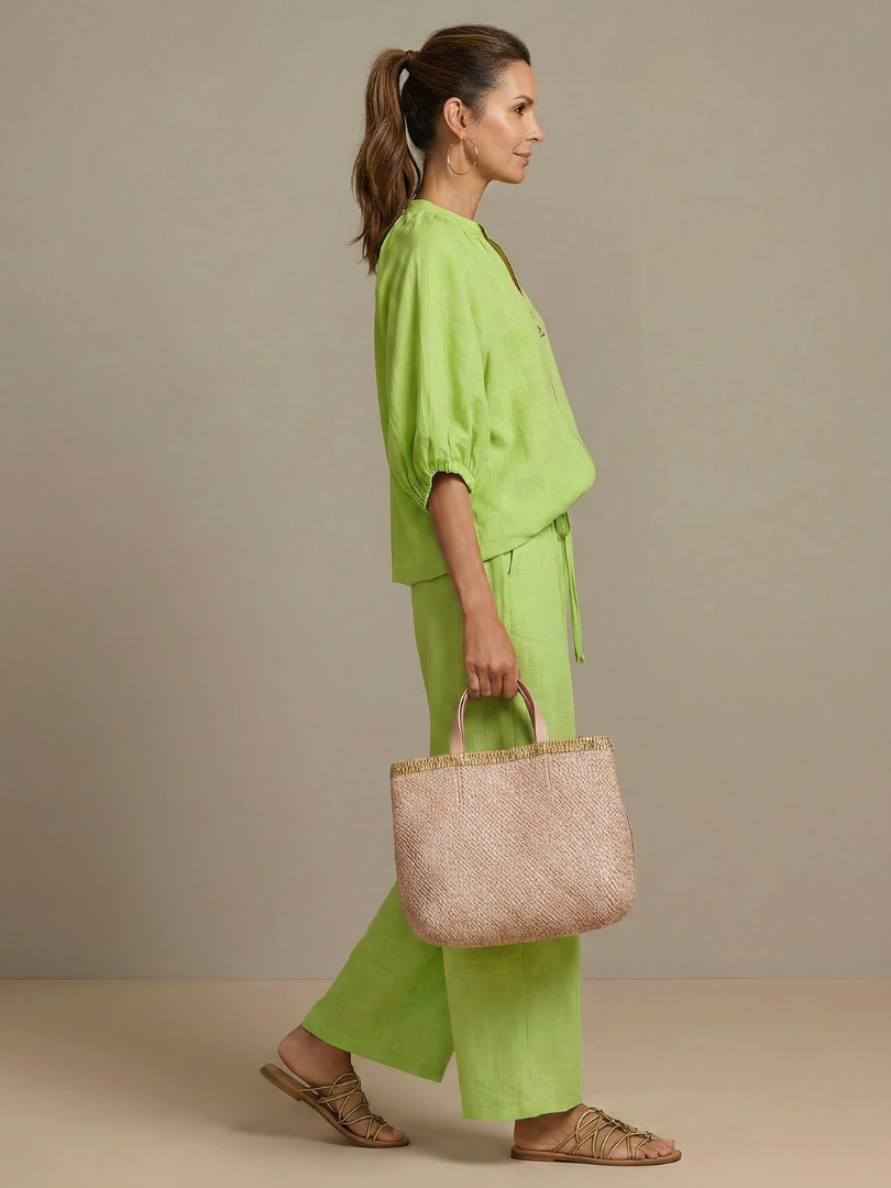 Green blouse and wide-leg pants set with zip-front, puff sleeves, drawstring waist