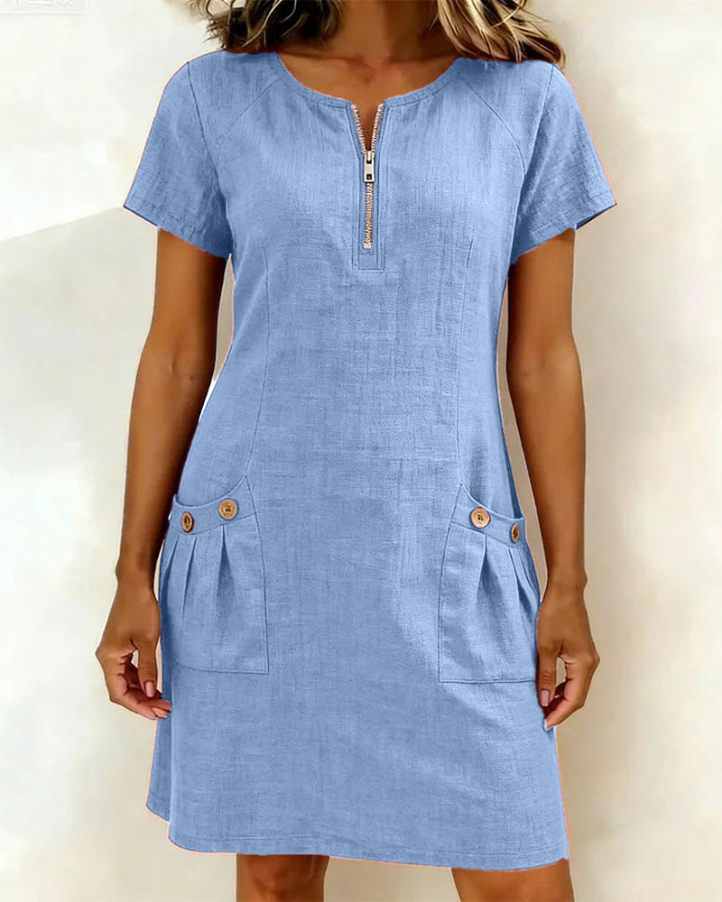 Blue casual zip-front dress with short sleeves and two front pockets