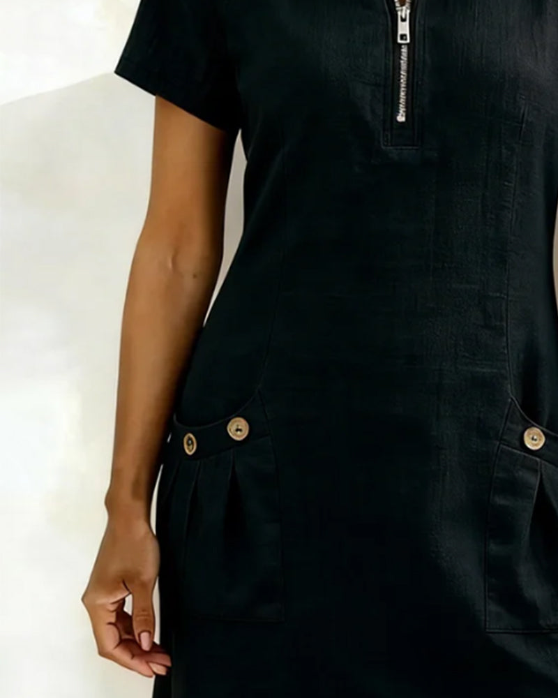 Black casual dress close-up with side pockets and half-zip placket