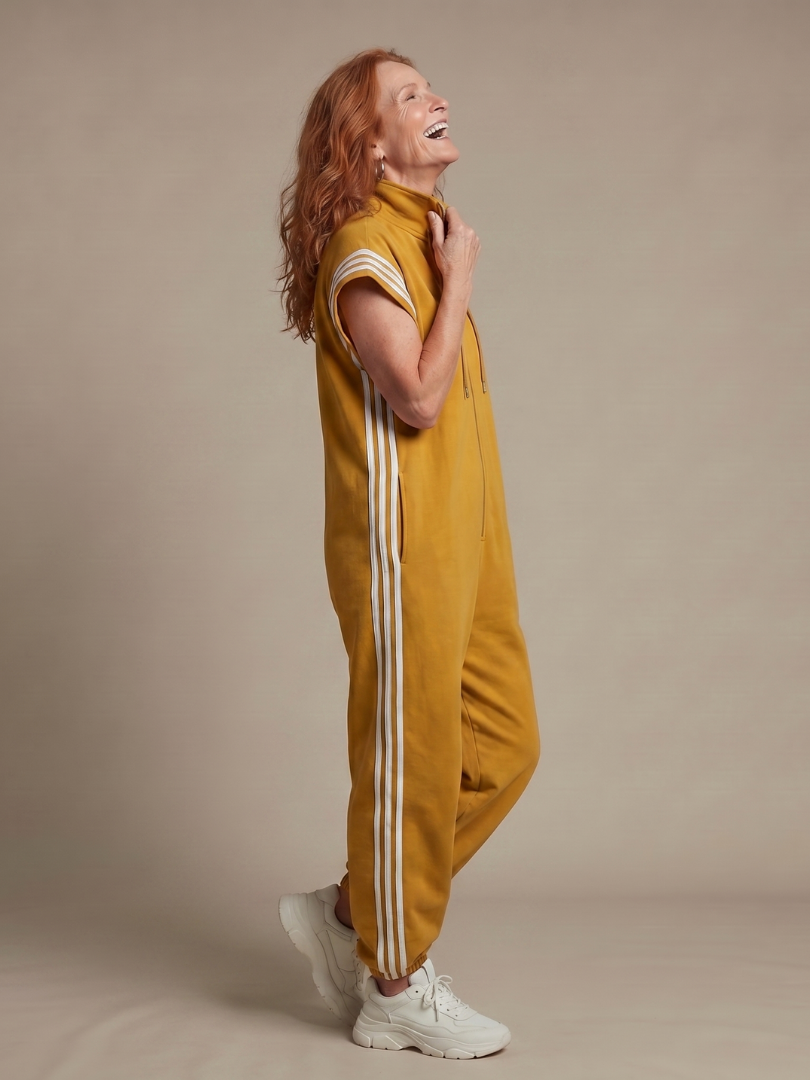 Women’s sleeveless zip-front jumpsuit in yellow with white stripe side and sleeve accents