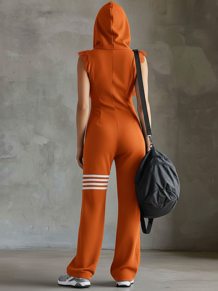 Orange zip-front hooded jumpsuit from back view with lace-trim shoulders and striped cuffs