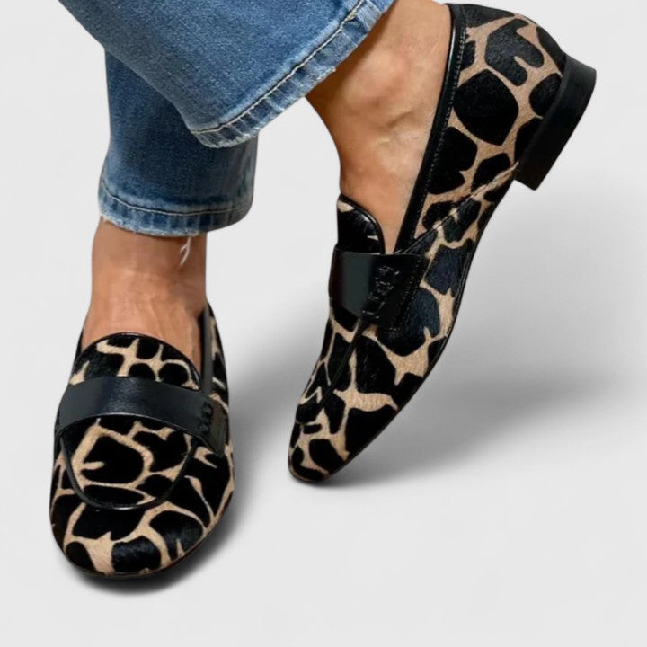 Leopard-print strap loafers with black buckle detail, low profile