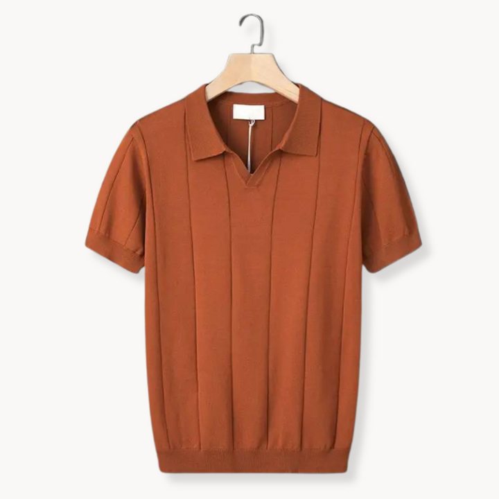 Terracotta cotton polo shirt on hanger with ribbed vertical knit texture and knit collar
