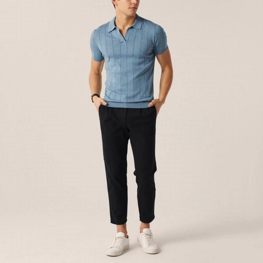 Blue cotton knit polo shirt on a model with short sleeves and button placket