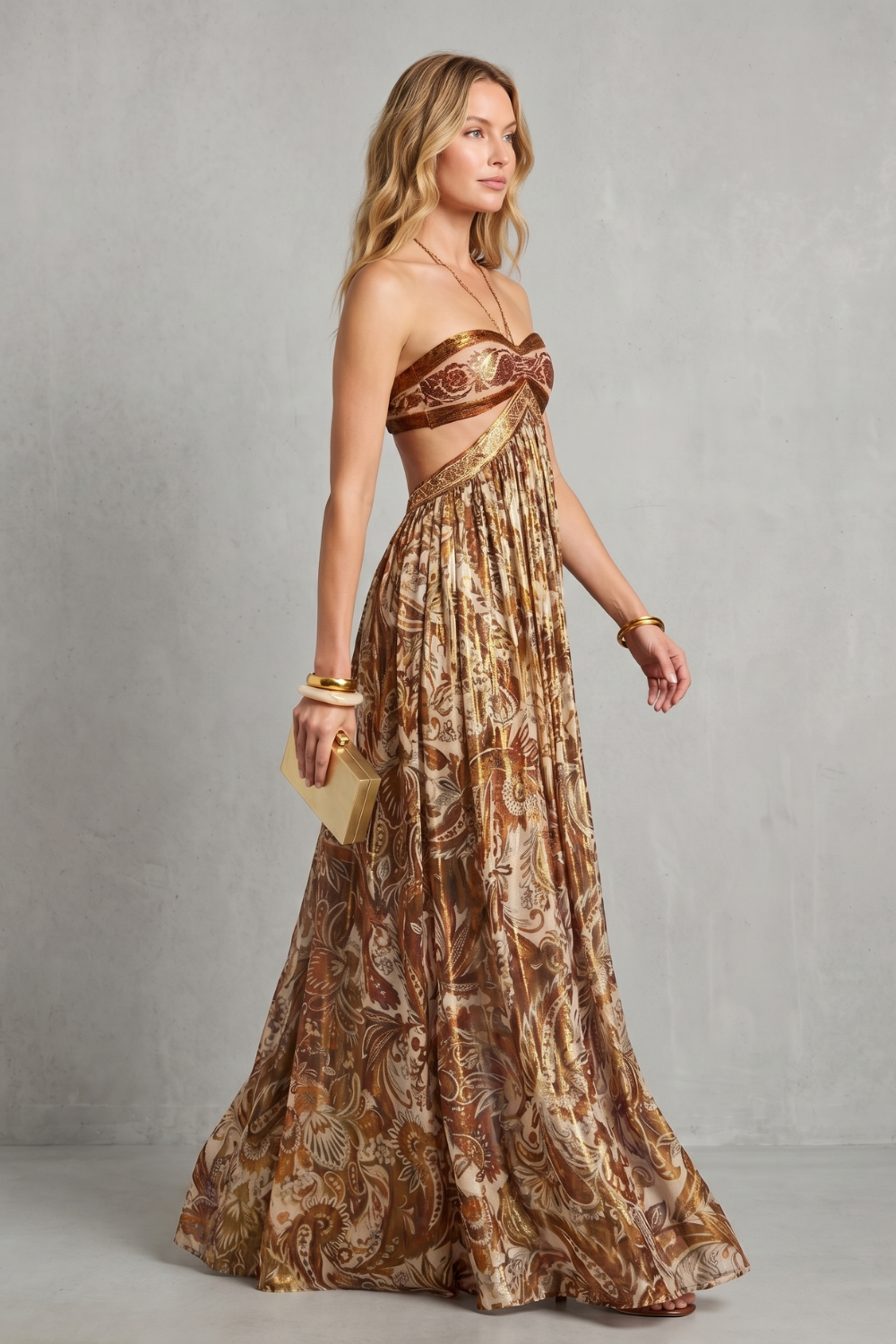 Gold paisley halter maxi dress with wrap-style sweetheart neckline and flowing skirt