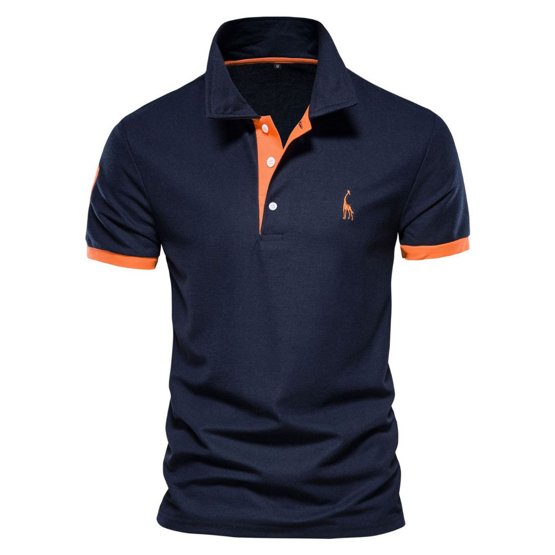Navy polo shirt with orange collar placket and sleeve cuffs, embroidered logo.