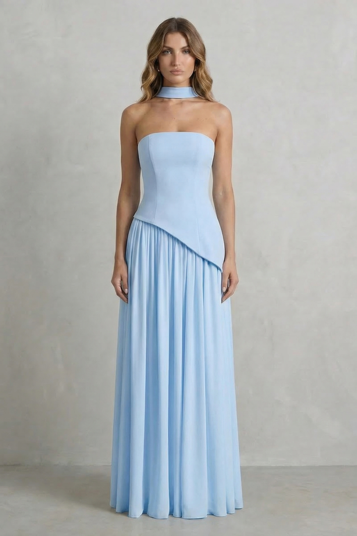 Strapless maxi dress in light blue with diagonal draped hem and pleated skirt