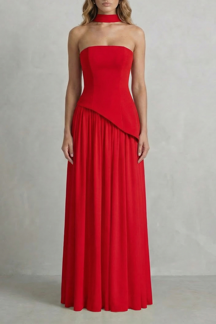 Red strapless draped maxi dress with diagonal overlay and pleated skirt