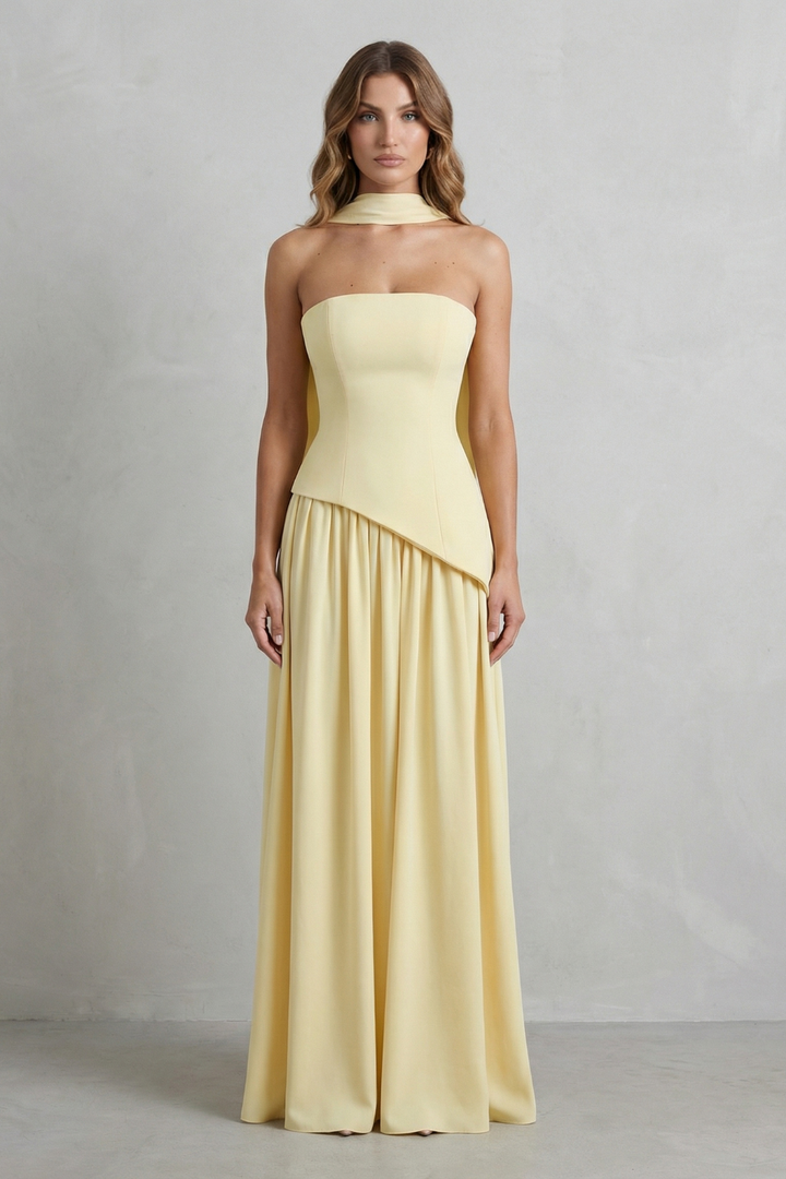 Strapless maxi dress in pale yellow with draped waist and gathered pleated skirt