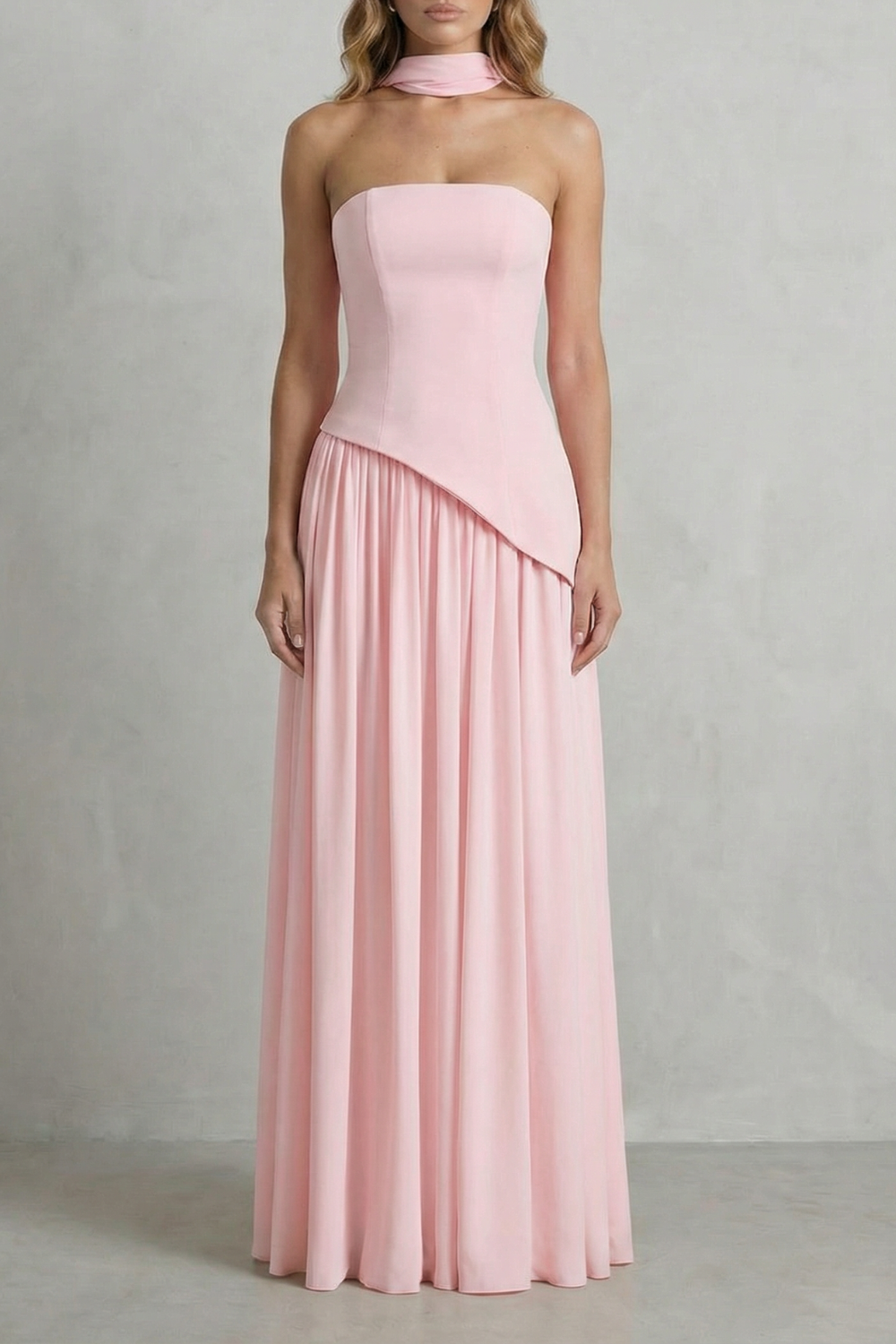 Strapless maxi dress in blush pink with draped waist and gathered pleated skirt