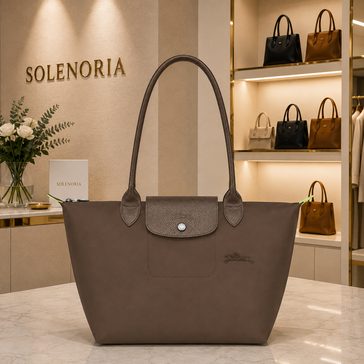 Medium terra tote bag in dark gray with top handles and front snap pocket