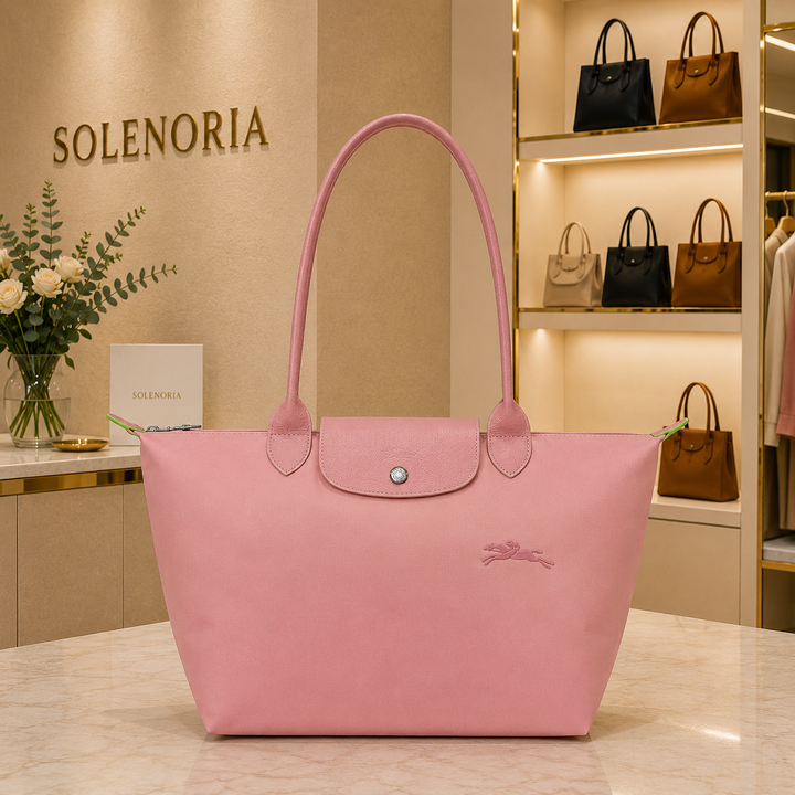 Petale pink medium tote bag with front flap pocket, button, and embroidered logo