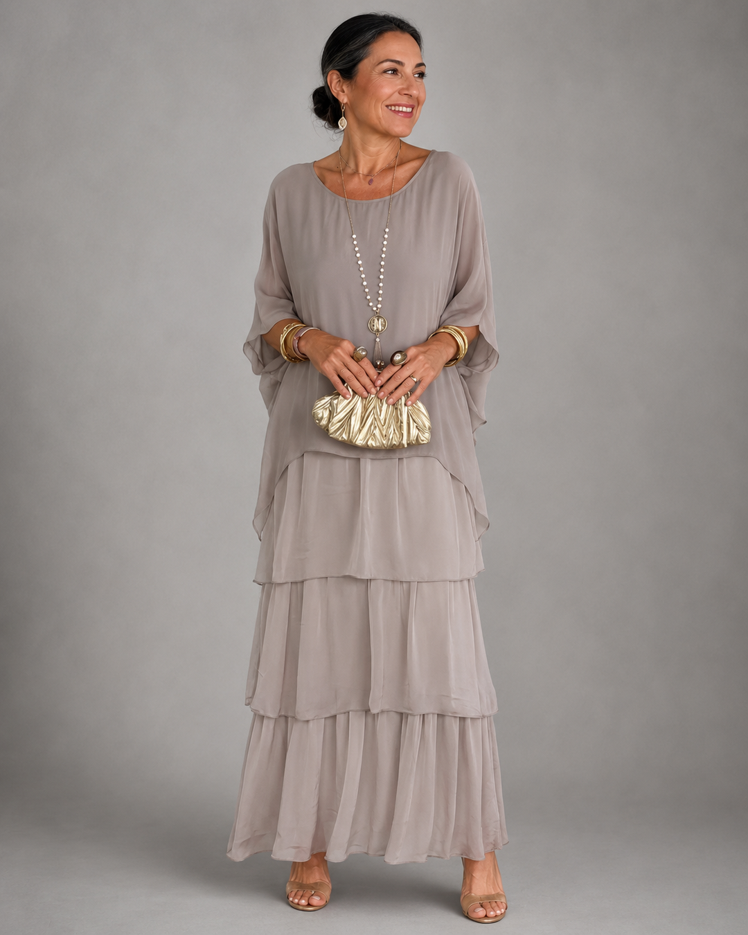 Gray tiered maxi dress with flowing three-quarter sleeves and round neckline