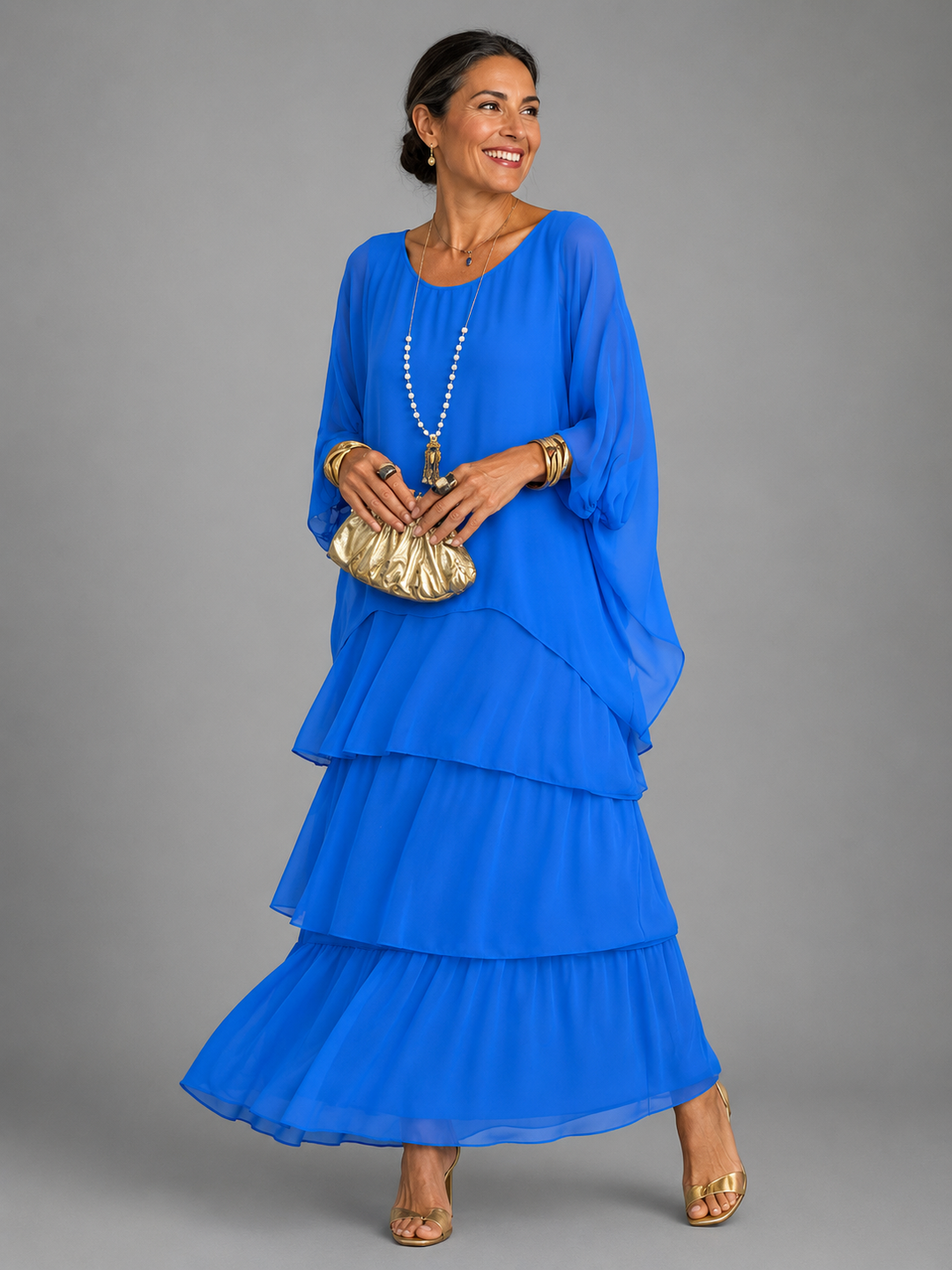 Blue tiered maxi dress with loose batwing sleeves and flowing layered hem