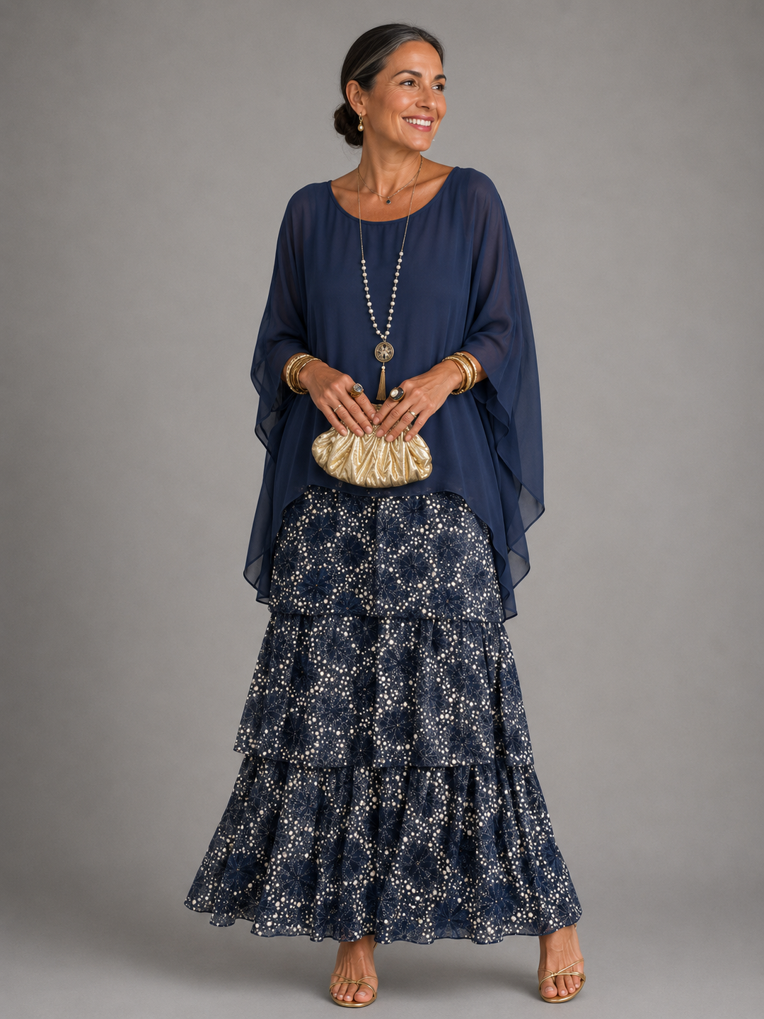 Dark blue maxi dress with tiered ruffles and sheer sleeves