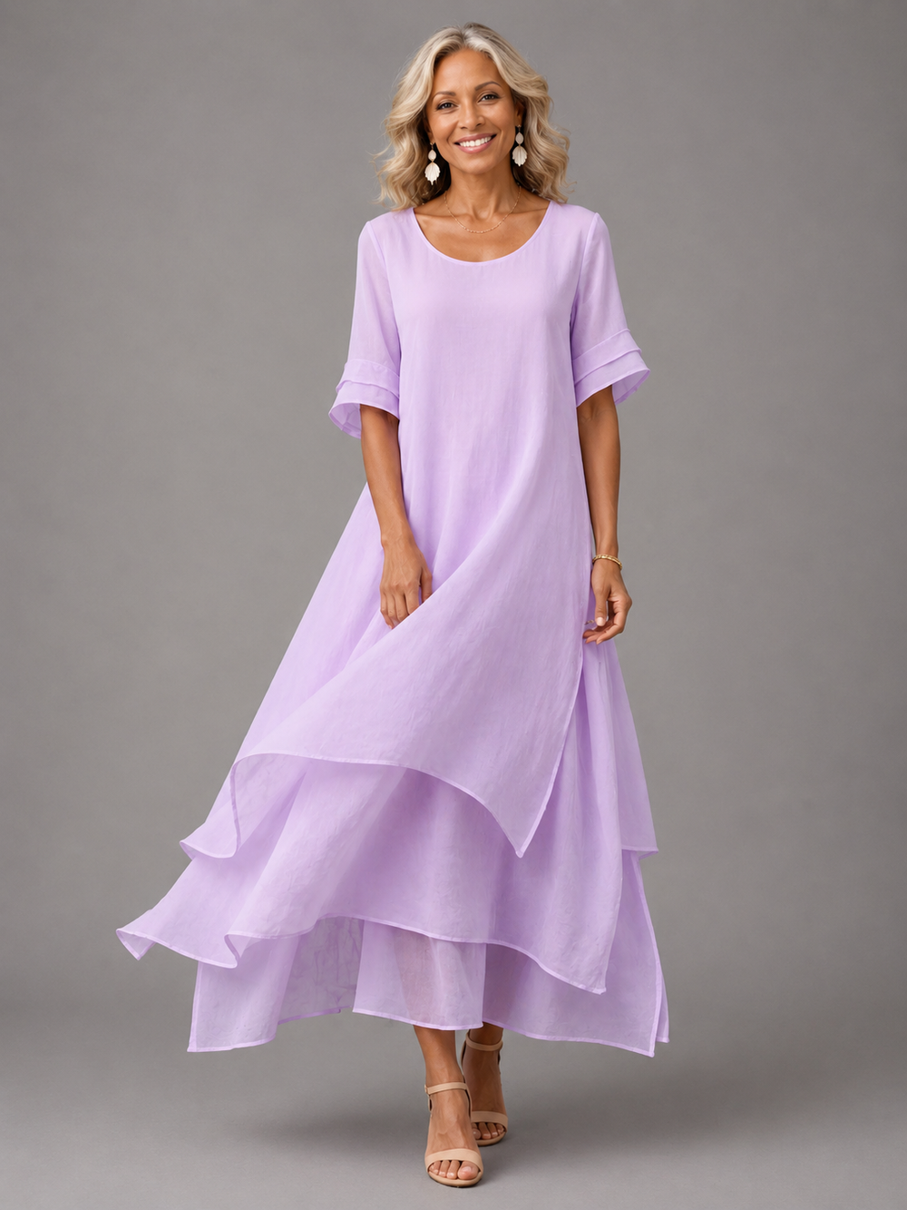 Purple maxi dress with cuffed short sleeves and tiered ruffle skirt
